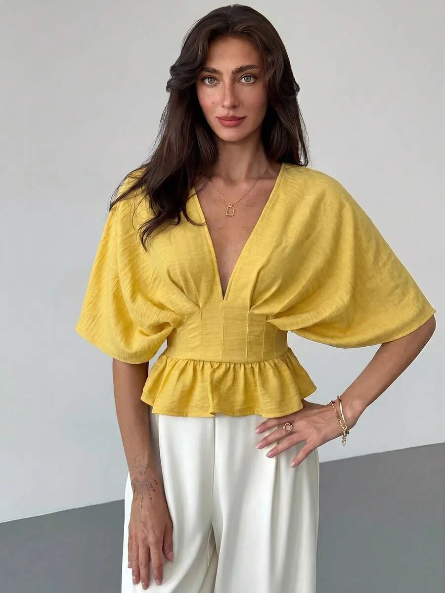 Aloruh Blusa de mujer con mangas tipo murciélago y cintura ceñida